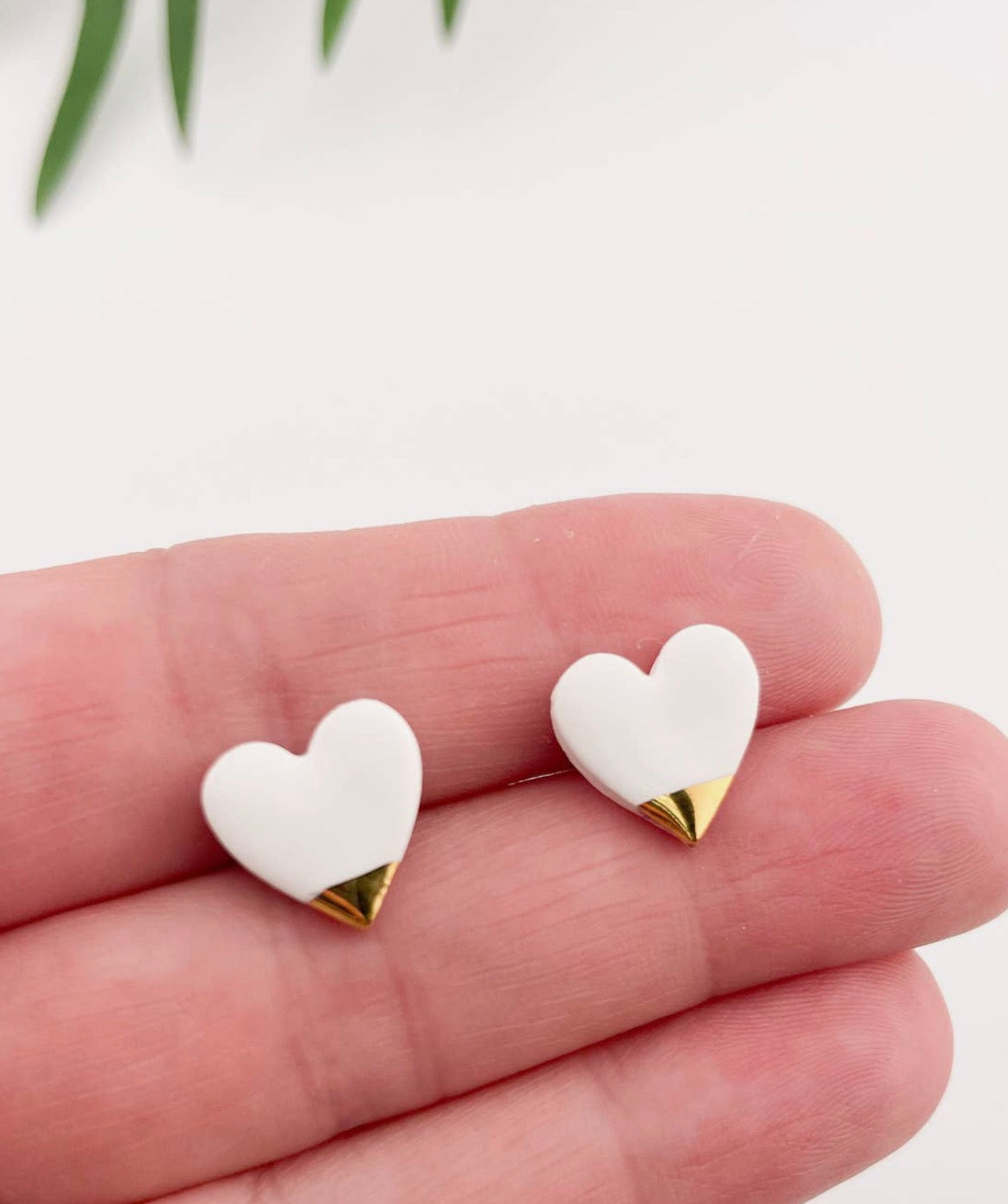 Clay blanca white gold tipped heart earrings