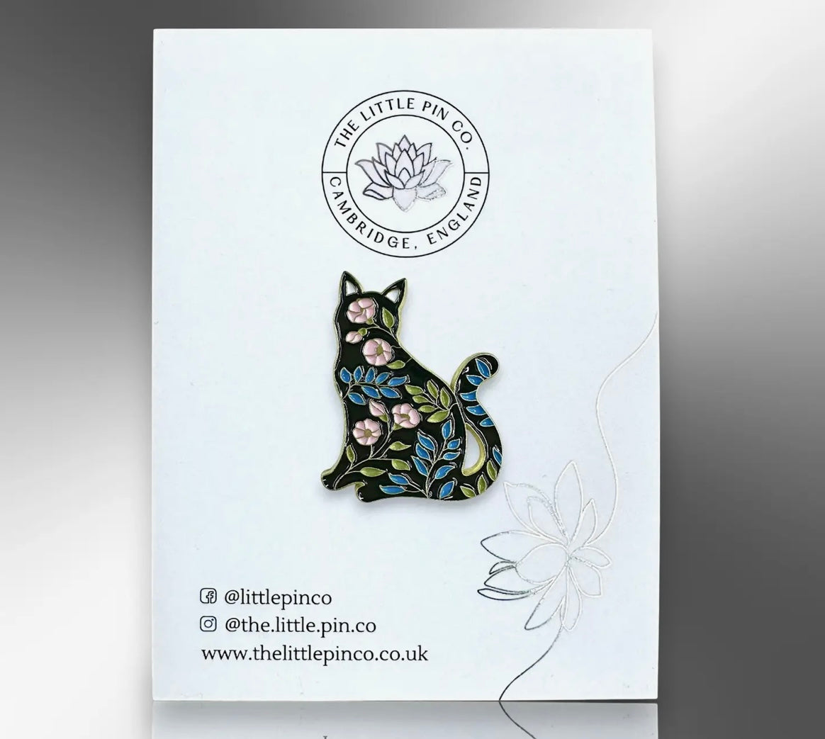 The little pin company “black cat with flowers” pin