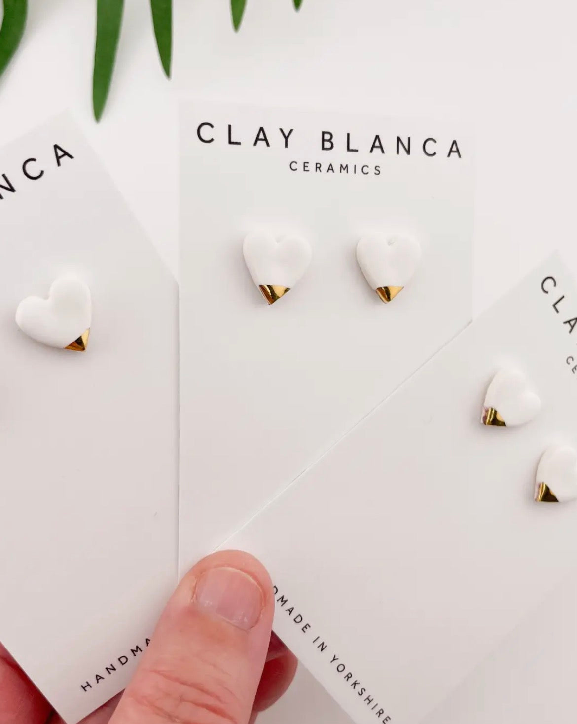 Clay blanca white gold tipped heart earrings