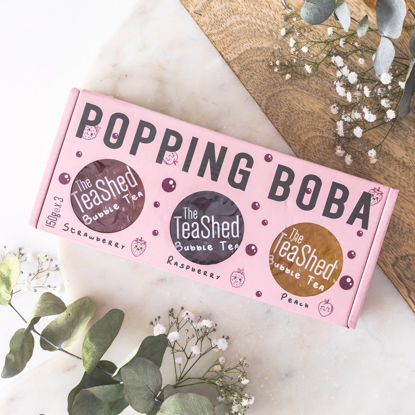 The tea shed popping boba trio: strawberry, raspberry and peach
