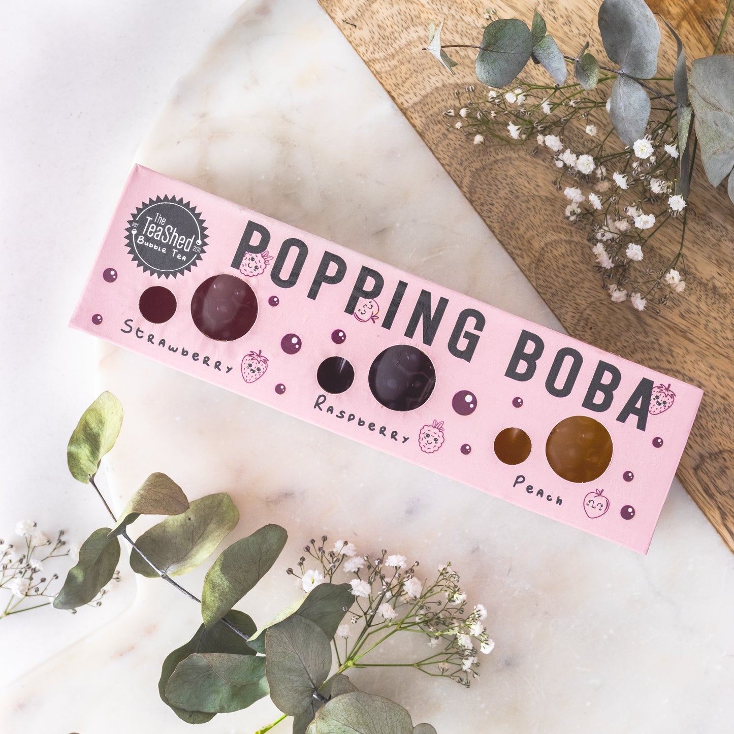 The tea shed popping boba trio: strawberry, raspberry and peach